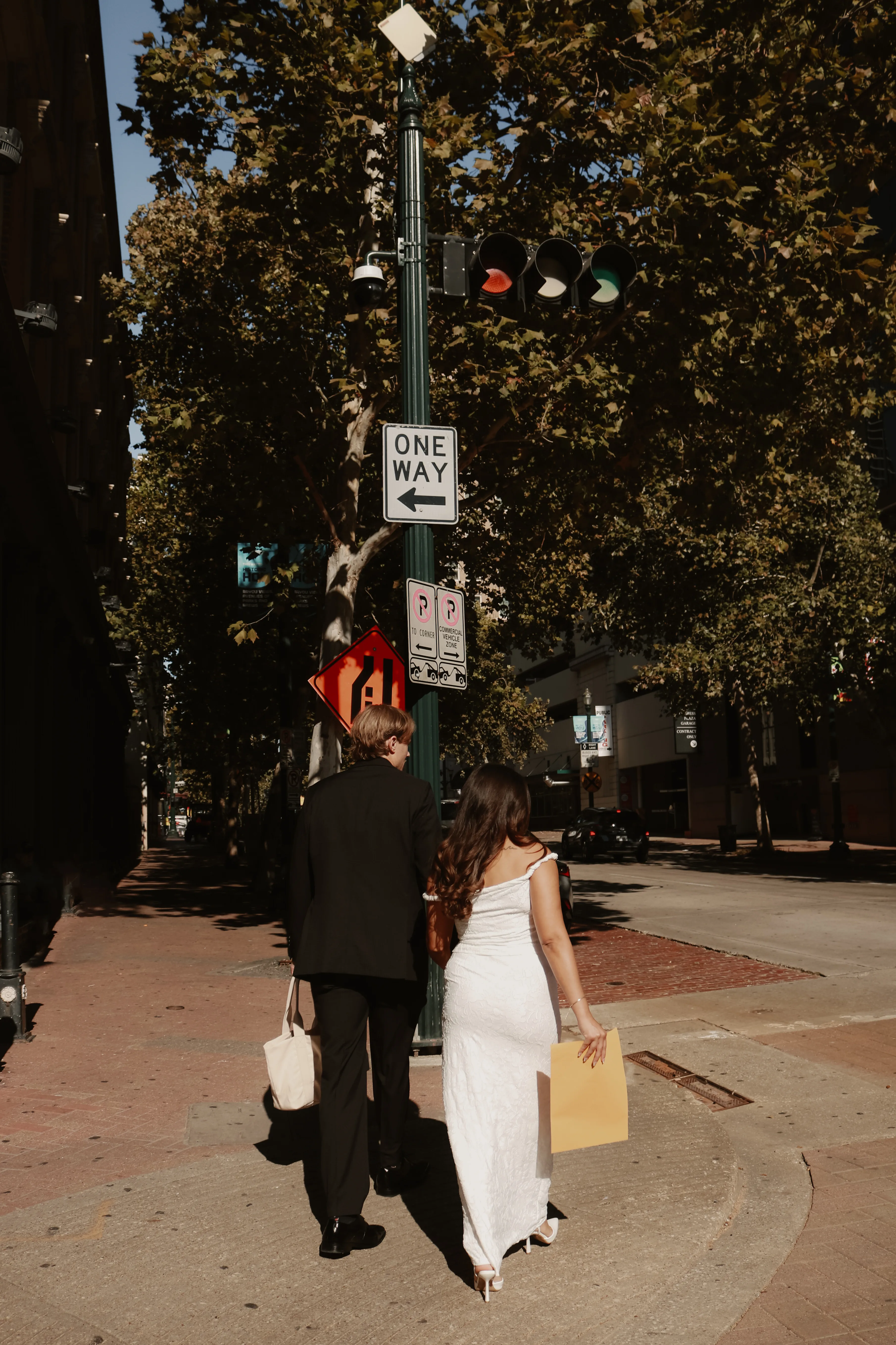 Courthouse wedding couple on a downtown street, lifestyle stock photo